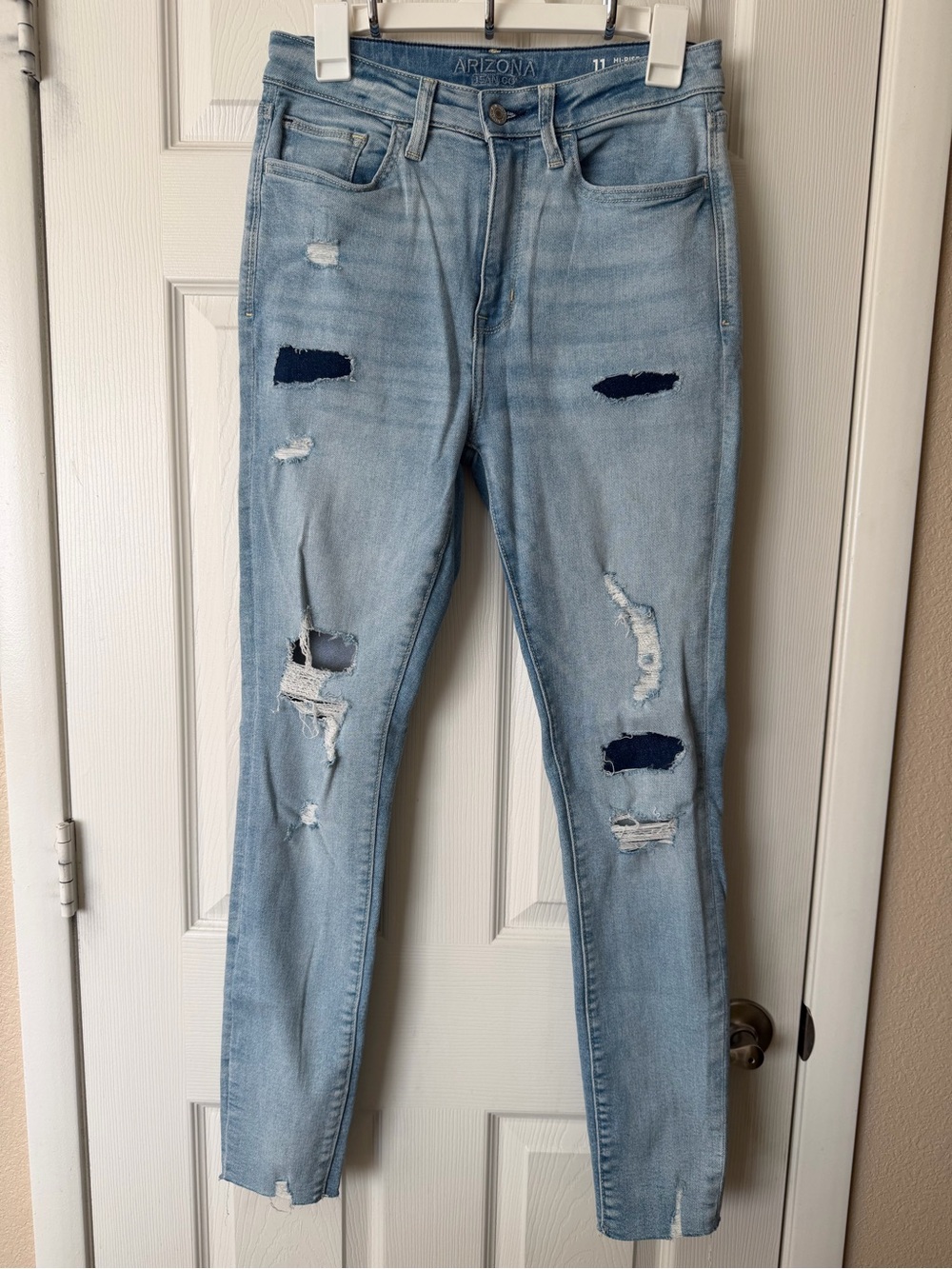 Arizona Jean Company Light Wash Skinny Jeans with Dark Patch Rips